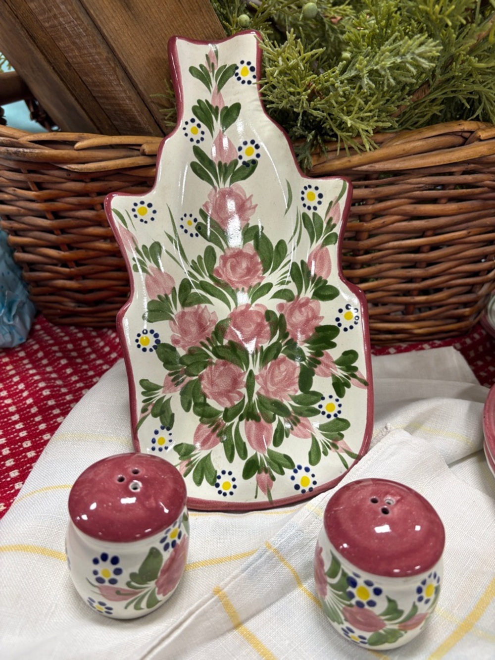 handcrafted from Mexico features pink rose floral design on white pottery